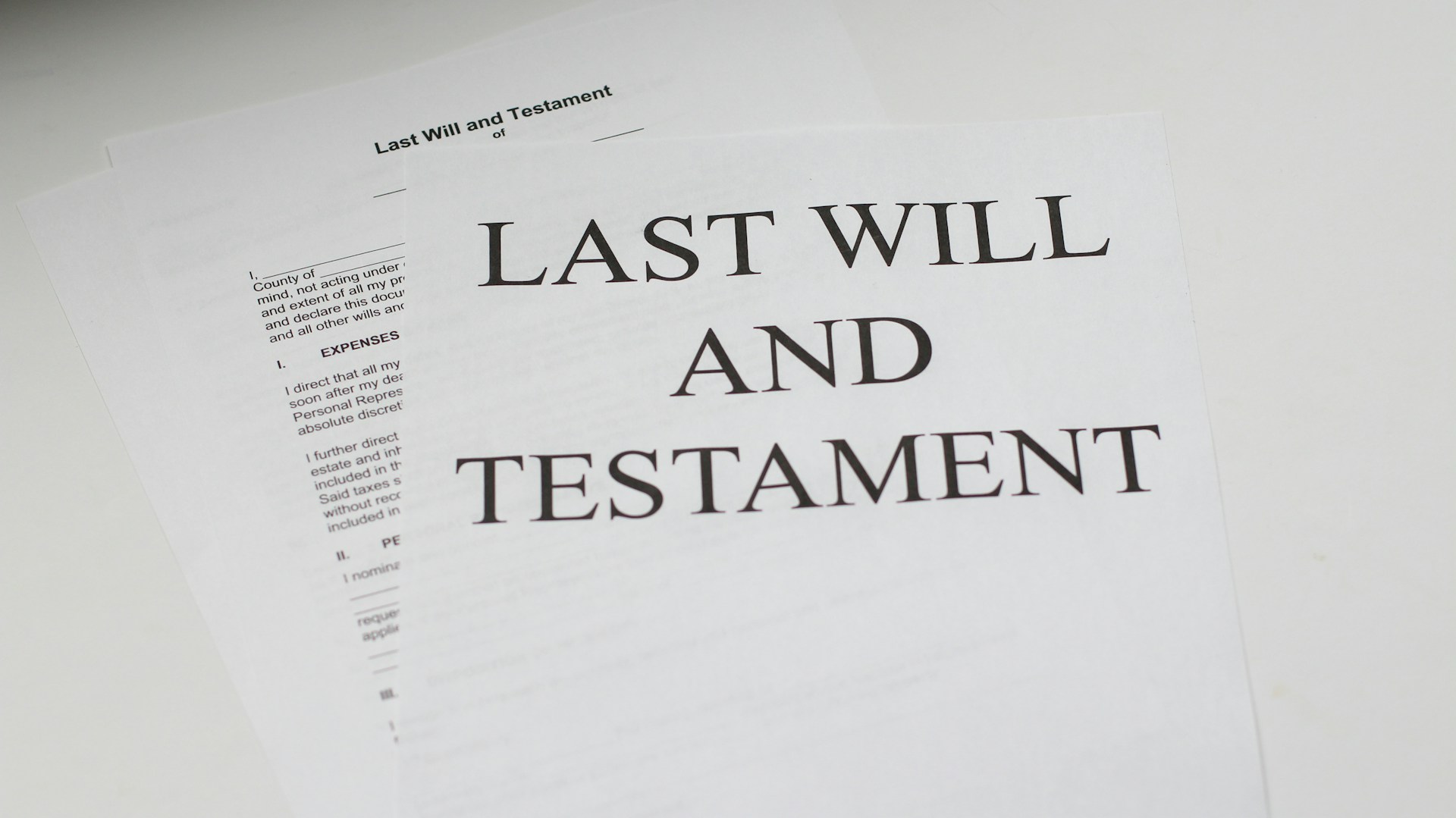 Last Will and Testament document on a desk representing the limitations of relying solely on a Will for estate planning.